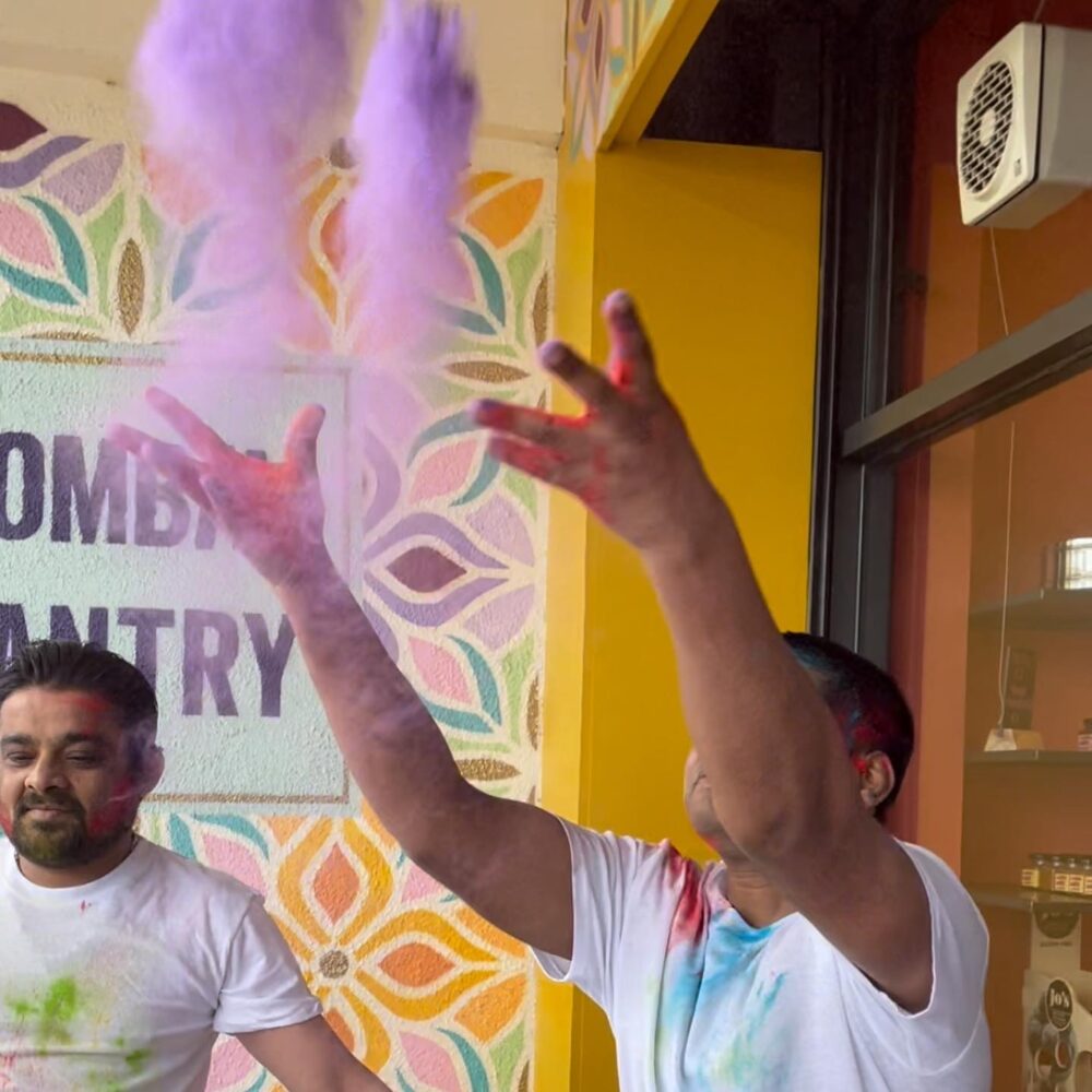 throwing of coloured powder in the air for Holi celebrations in Bombay Pantry Dublin.