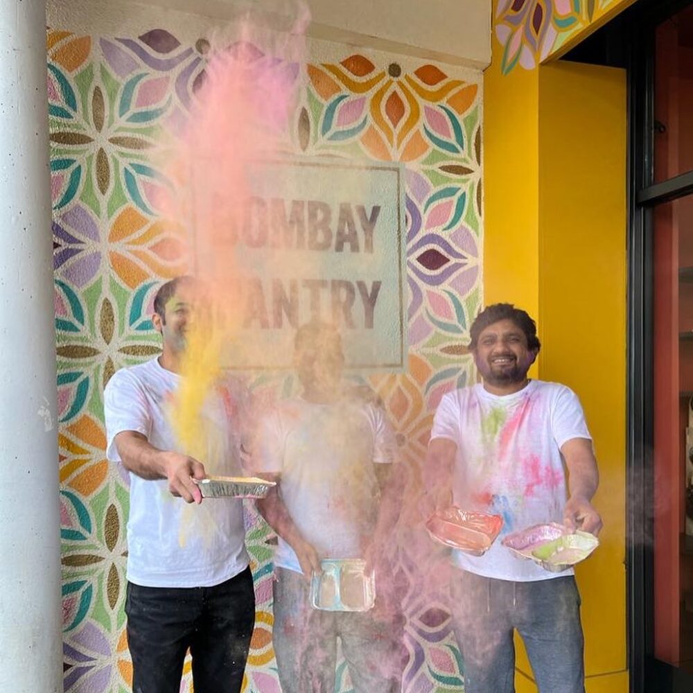 throwing of coloured powder for Holi celebrations at Bombay Pantry Dublin.